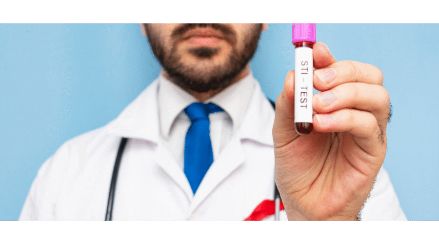 doctor con tubo de sangre para prueba de ets